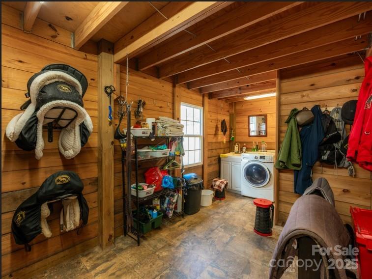 2921 North Pacolet Road Landrum, SC 29356 - Photo 26 of 37 a view of walk in closet with clothes and shoes