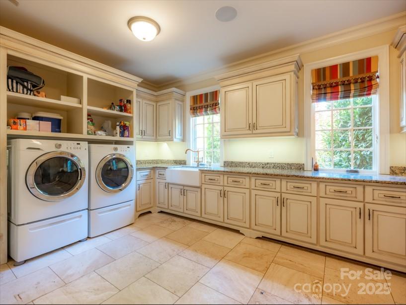 2921 North Pacolet Road Landrum, SC 29356 - Photo 10 of 37 a utility room with sink dryer and washer