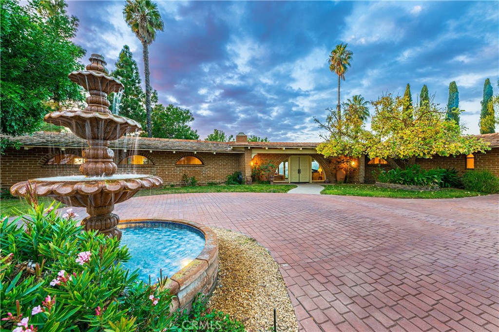 3275 Sumac Road Fallbrook, CA 92028 - Photo 1 of 1 a view of a garden with plants and a lake view