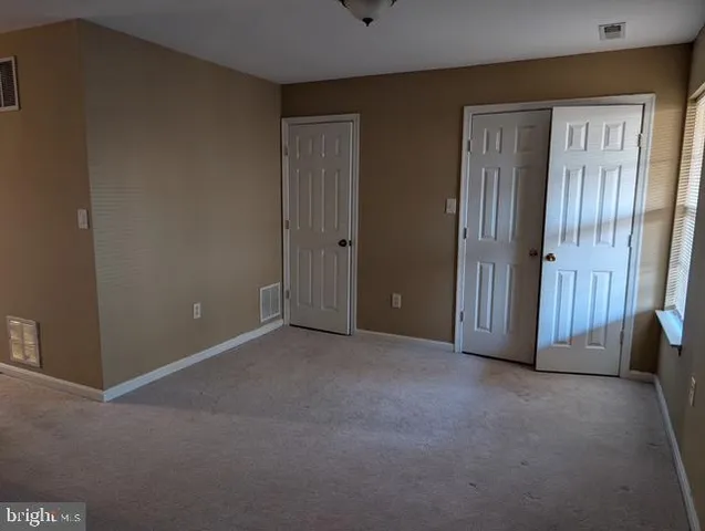 a view of a livingroom with entryway