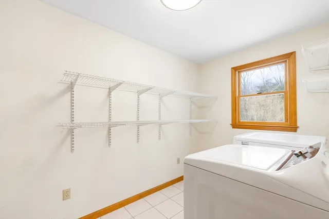 a bathroom with a sink and a window