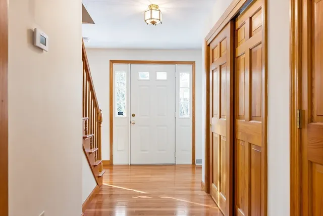 a view of an entryway with a floor to ceiling window