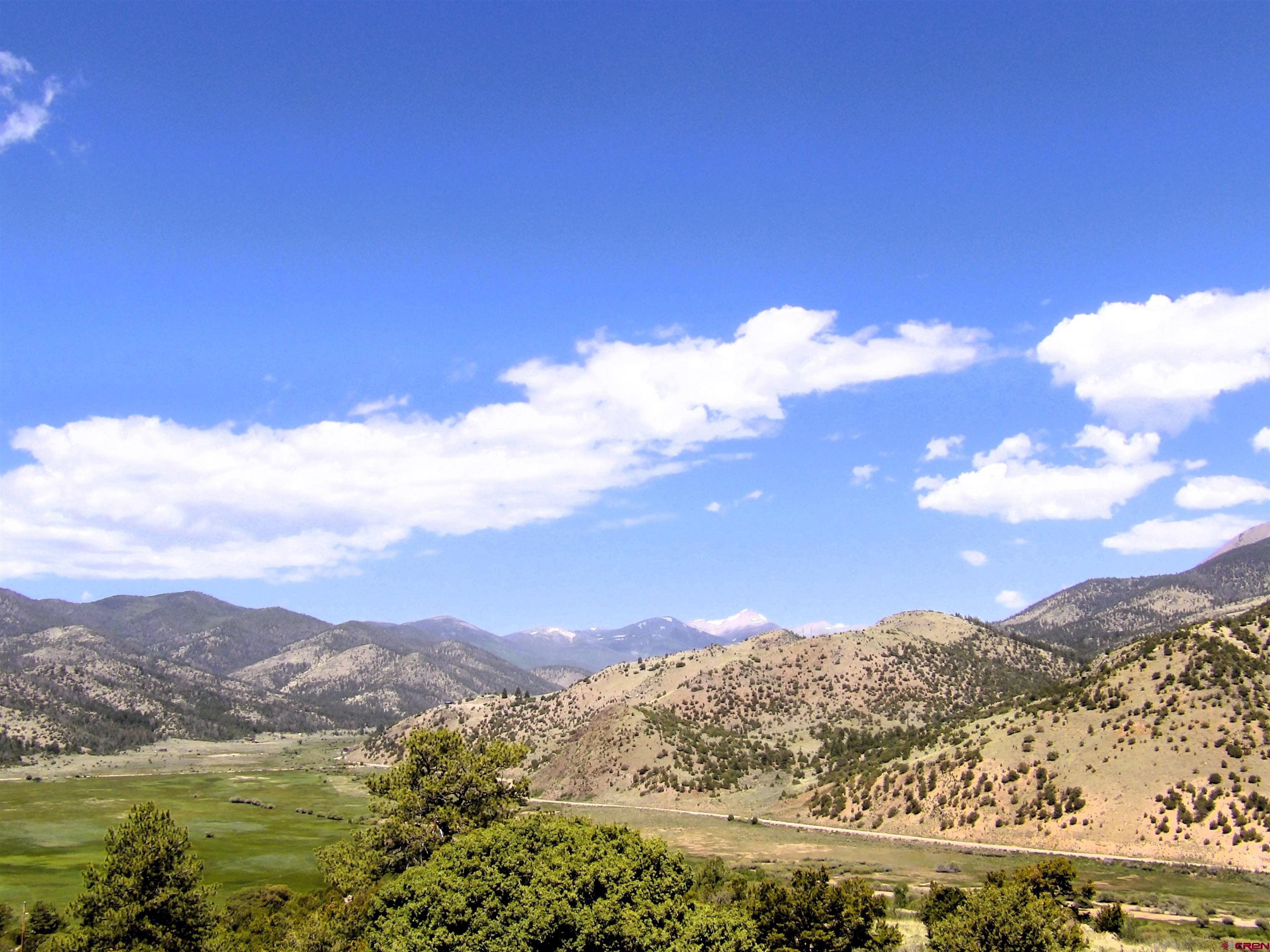 Tbd County Rd LL56 Villa Grove, CO 81155 - Photo 12 of 24 a view of a city with mountains in the background