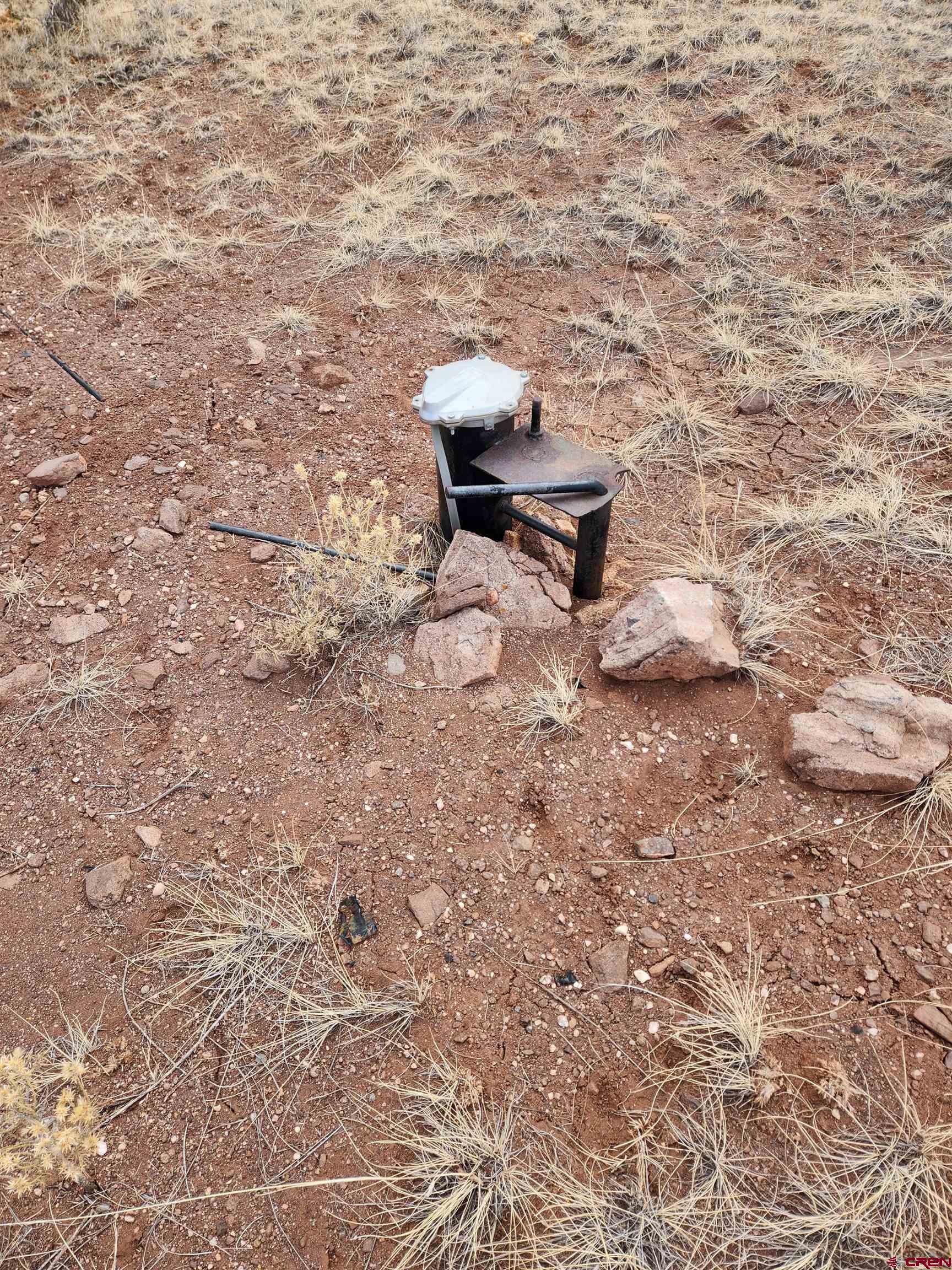Tbd County Rd LL56 Villa Grove, CO 81155 - Photo 13 of 24 a bench sitting in middle of a yard