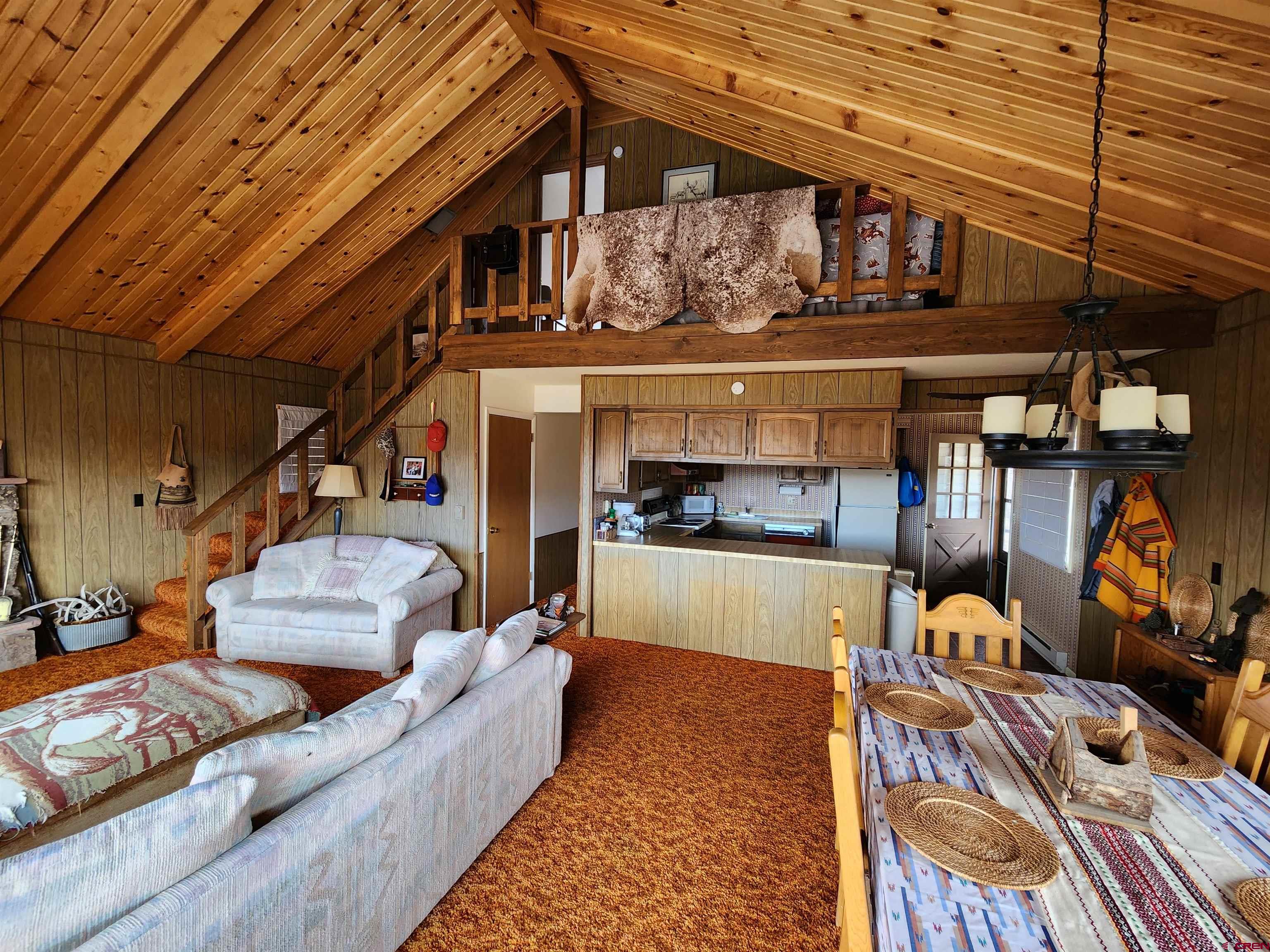 Tbd County Rd LL56 Villa Grove, CO 81155 - Photo 19 of 24 a living room with furniture and a fireplace