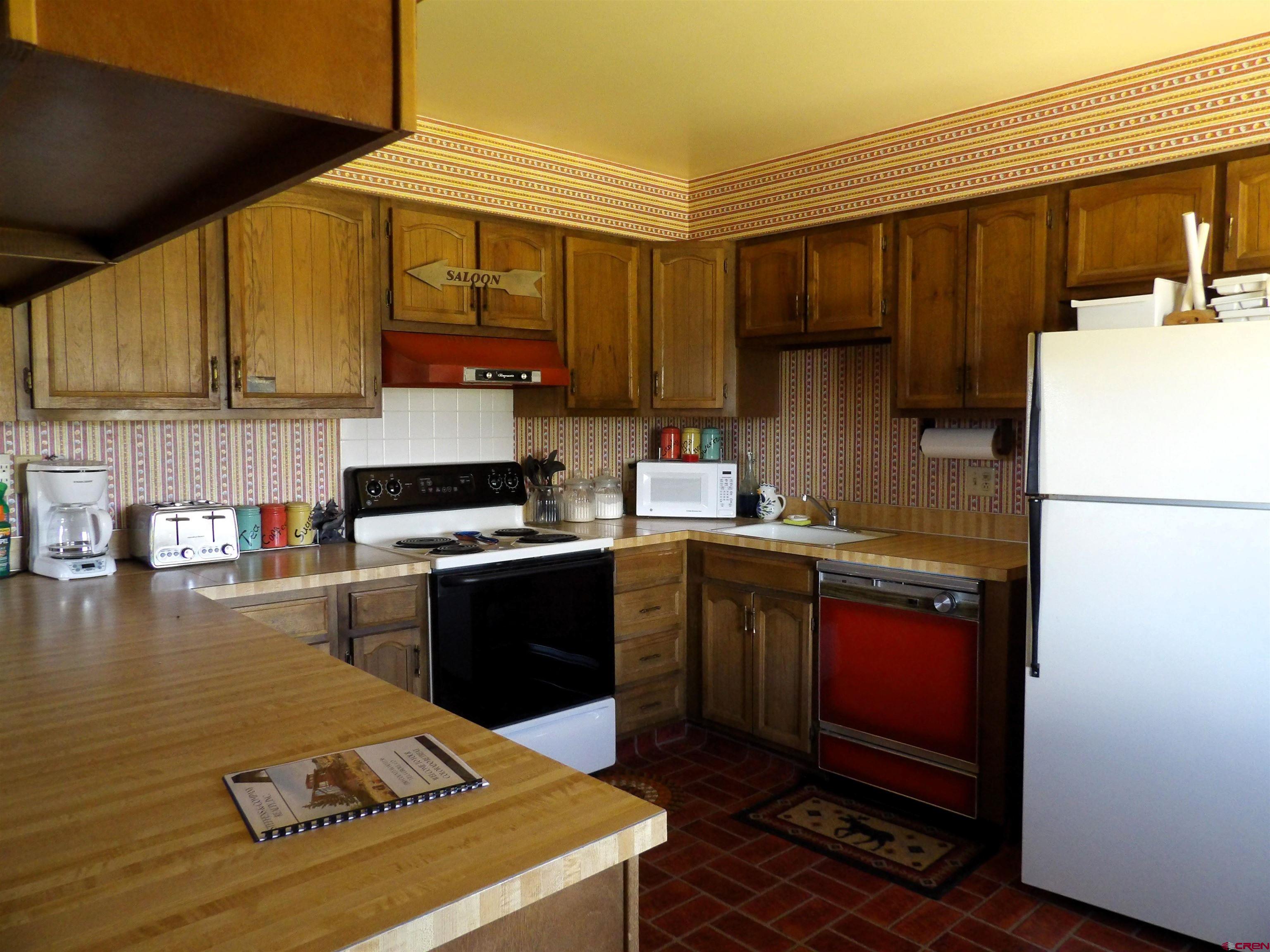 Tbd County Rd LL56 Villa Grove, CO 81155 - Photo 20 of 24 a kitchen with a sink appliances and cabinets