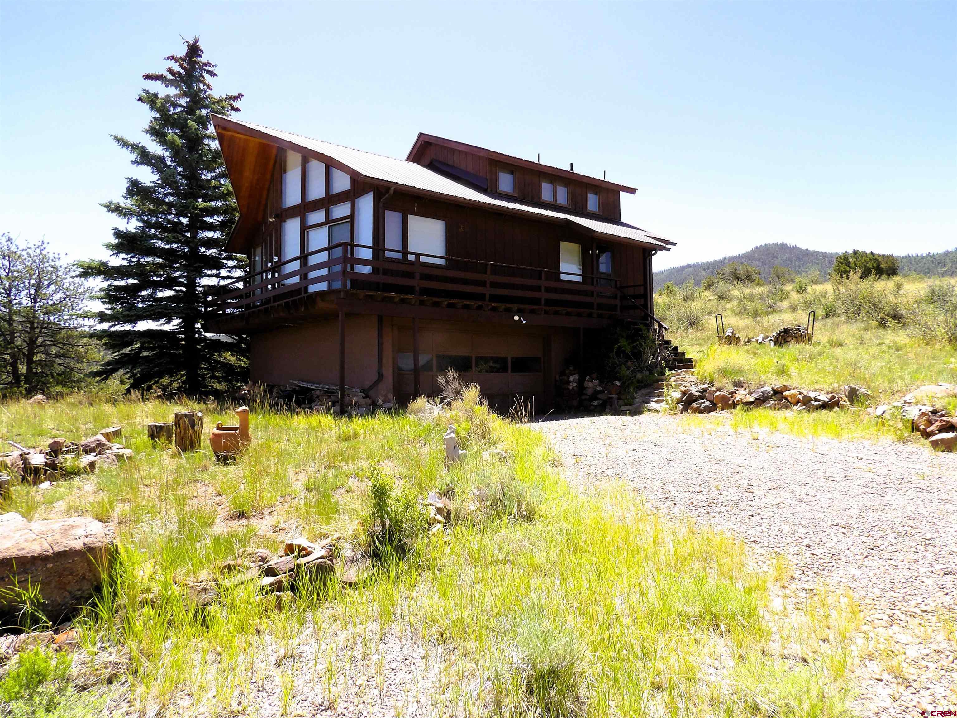 Tbd County Rd LL56 Villa Grove, CO 81155 - Photo 2 of 24 a view of a house with a yard