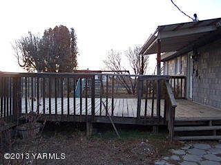 3900 Progressive Road Wapato, WA 98951 - Photo 3 of 14 a view of backyard with deck and wooden floor
