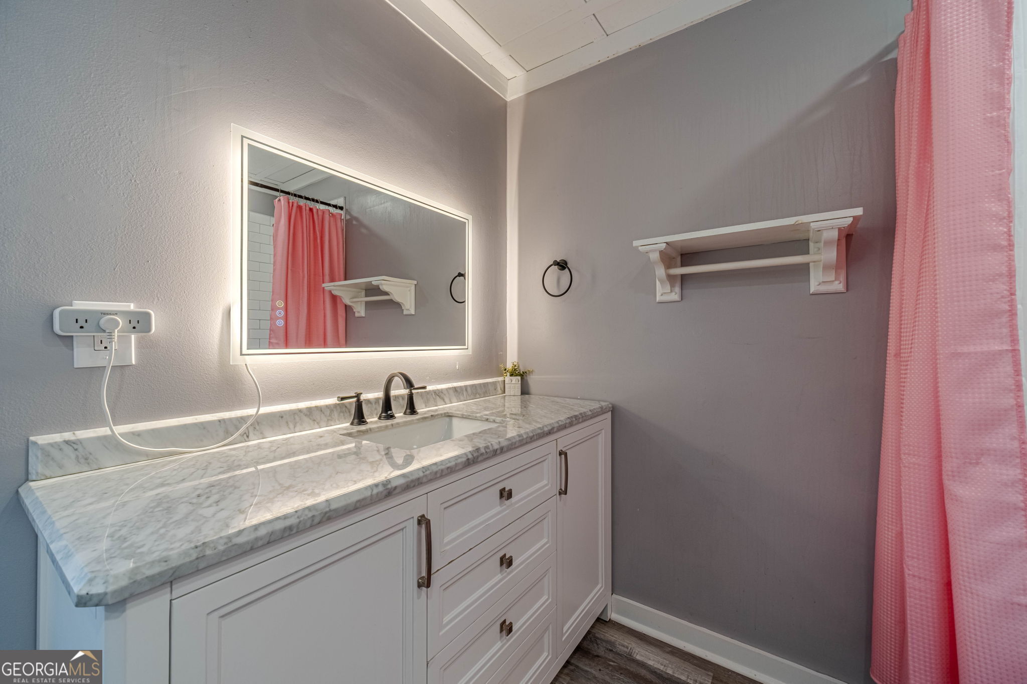 2811 High Shoals Road Good Hope, GA 30641 - Photo 18 of 37 a bathroom with a granite countertop sink and a mirror