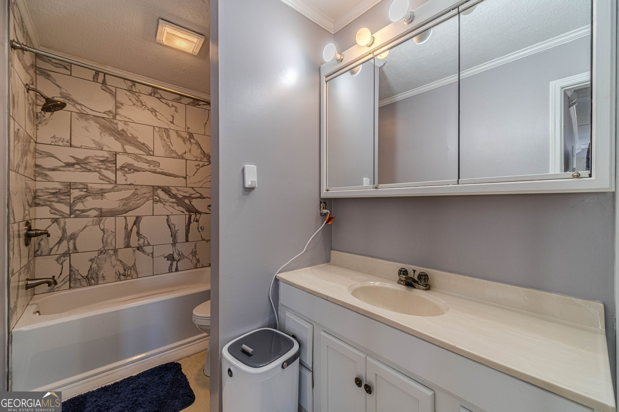 2811 High Shoals Road Good Hope, GA 30641 - Photo 23 of 37 a bathroom with a sink and a bathtub
