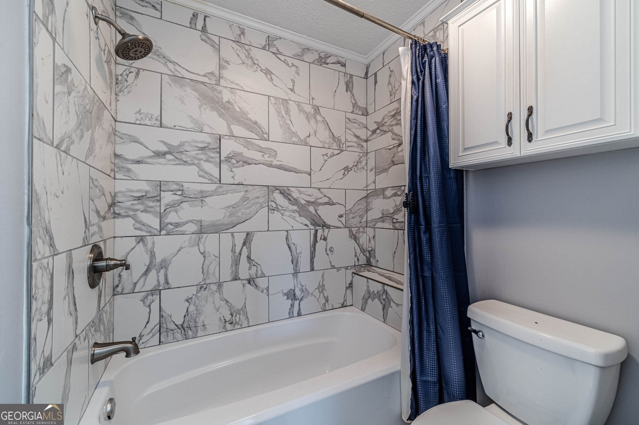 2811 High Shoals Road Good Hope, GA 30641 - Photo 24 of 37 a bathroom with a toilet and a bathtub