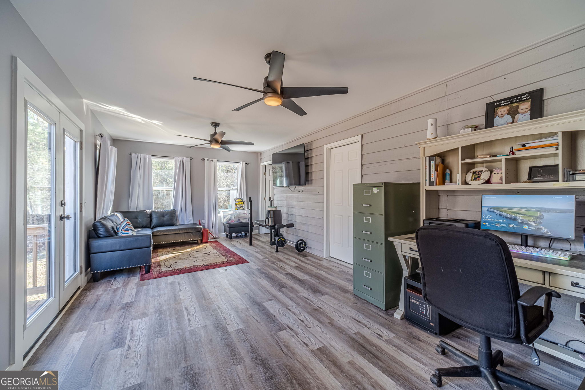2811 High Shoals Road Good Hope, GA 30641 - Photo 26 of 37 a living room with furniture and wooden floor