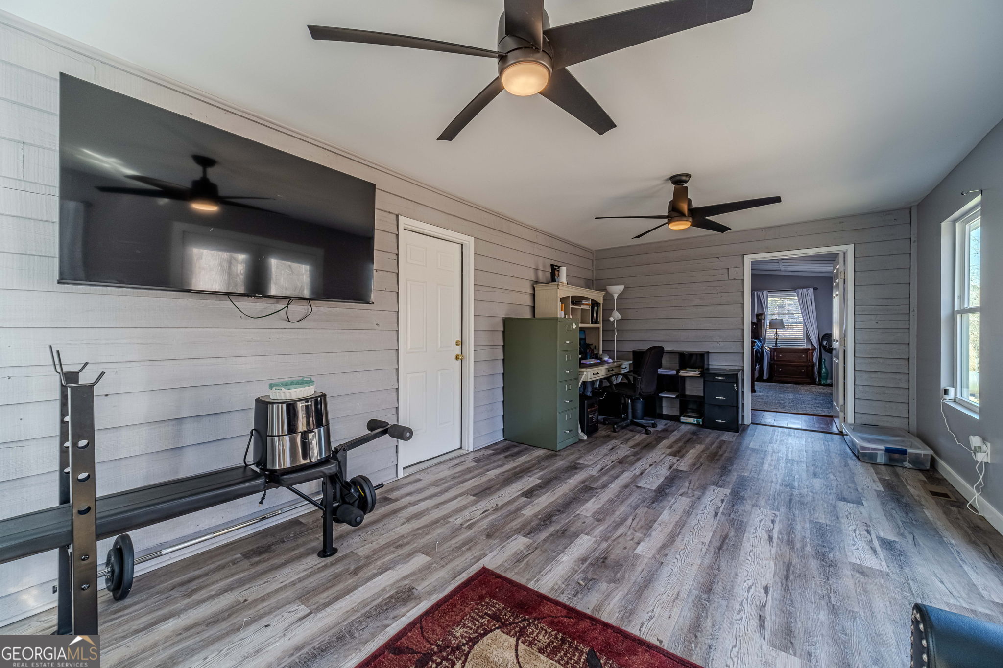 2811 High Shoals Road Good Hope, GA 30641 - Photo 27 of 37 a view of a livingroom with furniture and a ceiling fan
