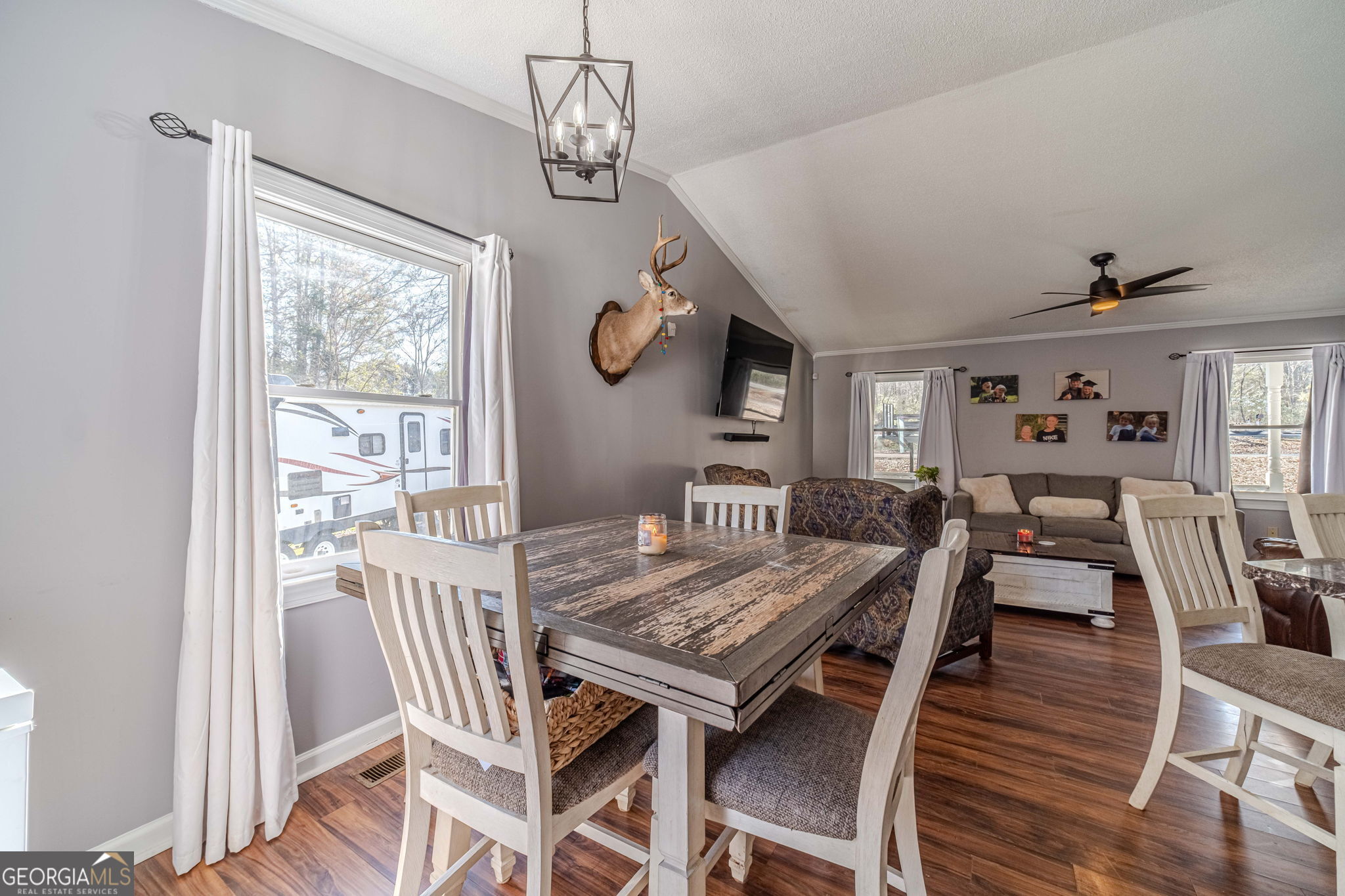 2811 High Shoals Road Good Hope, GA 30641 - Photo 7 of 37 a view of a dining room with furniture wooden floor and chandelier