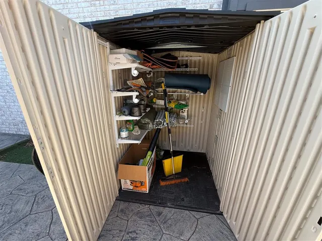 a view of a backyard of a house