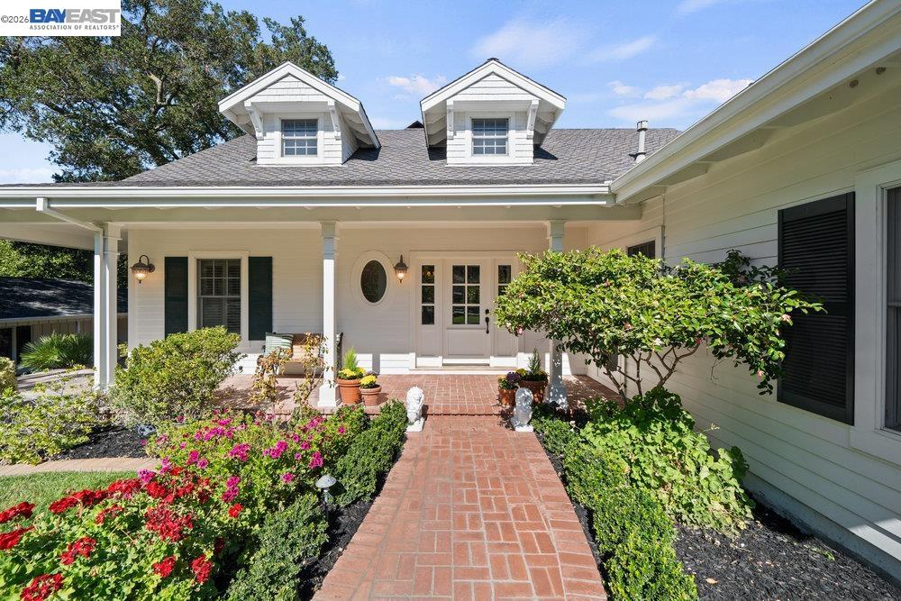 5280 Sheridan Road Sunol, CA 94586 - Photo 9 of 59 a front view of a house with a garden