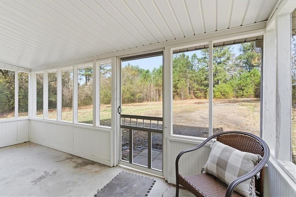 344 Colbert Road Dallas, GA 30132 - Photo 26 of 29 a room with furniture and a window