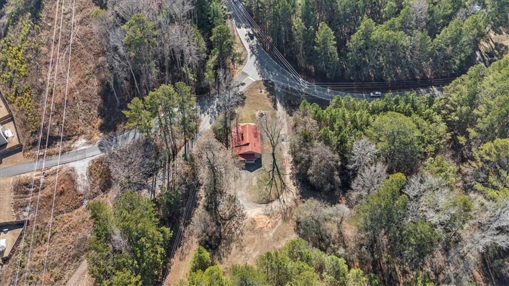 344 Colbert Road Dallas, GA 30132 - Photo 28 of 29 a backyard of a house with lots of green space
