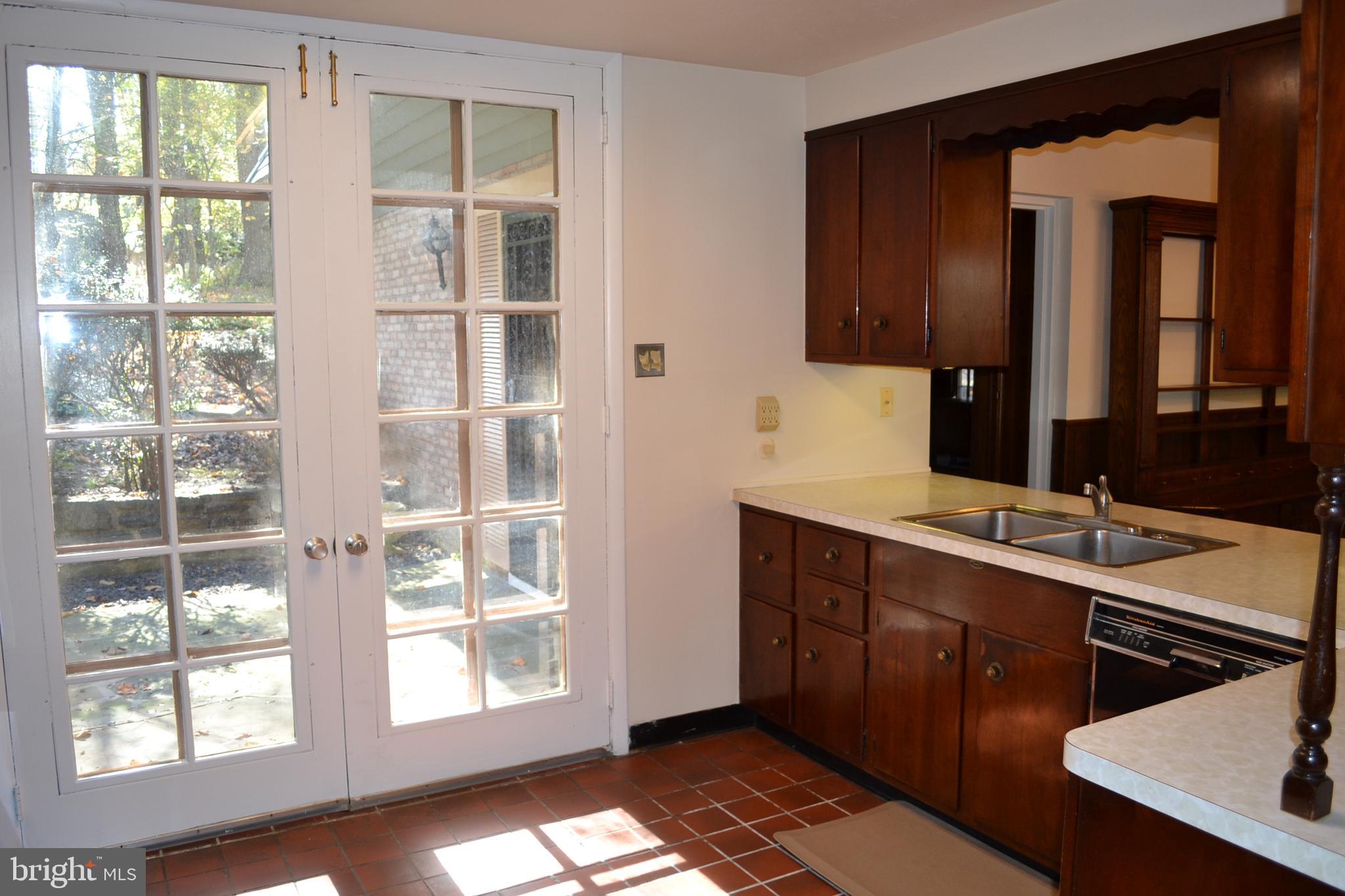 1720 Lynam Road Abington, PA 19001 - Photo 12 of 40 Kitchen with french doors to rear patio