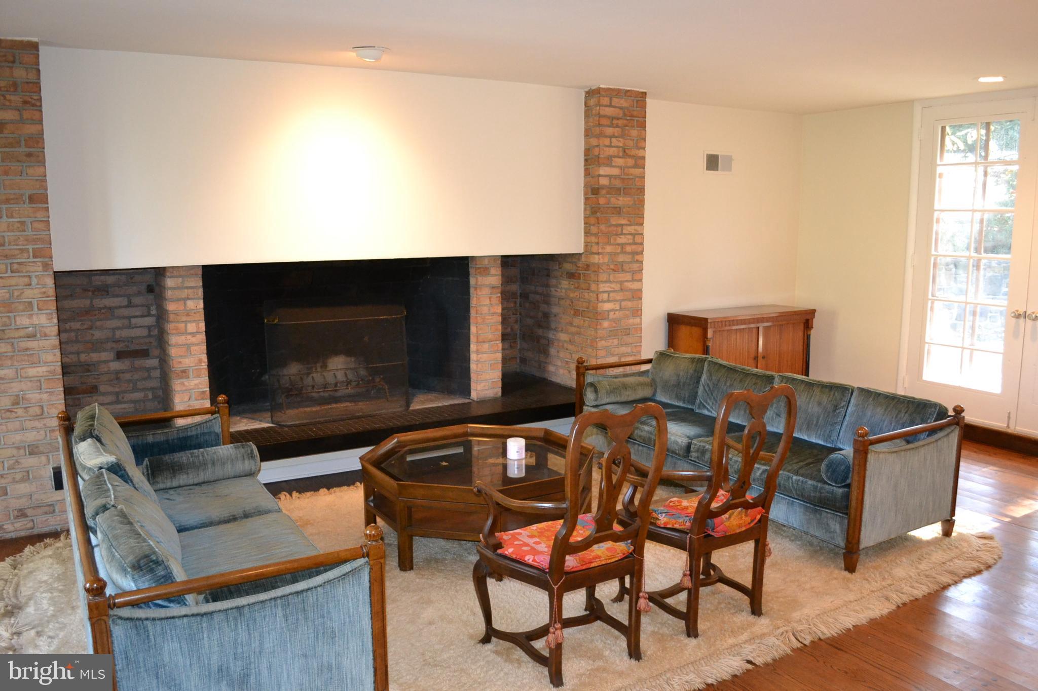 1720 Lynam Road Abington, PA 19001 - Photo 4 of 40 Contemporary style living room with brick fireplac