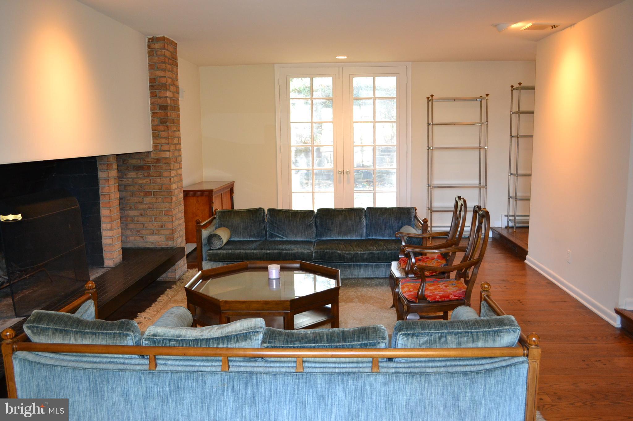 1720 Lynam Road Abington, PA 19001 - Photo 5 of 40 Spacious living room with french doors to rear pat