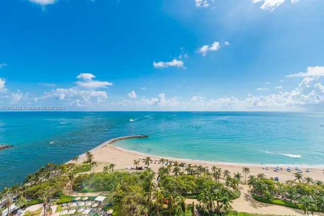 a view of a lake with a big yard