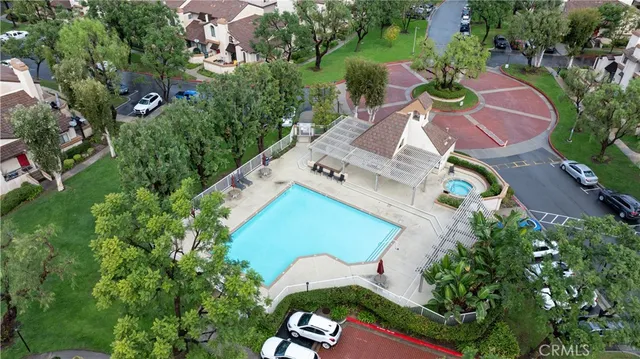 an aerial view of a house with a garden