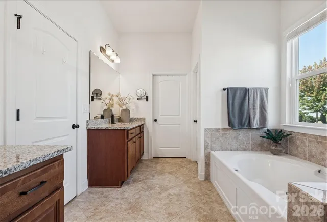 a bathroom with a toilet a sink and a bathtub