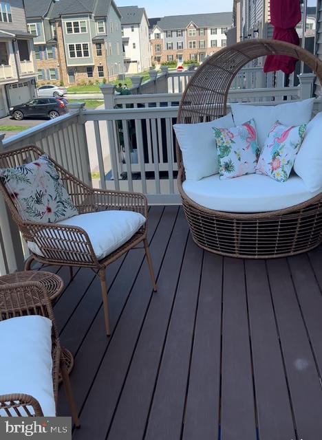 213 Lyons Creek Drive Laurel, MD 20708 - Photo 12 of 18 a view of a balcony with furniture