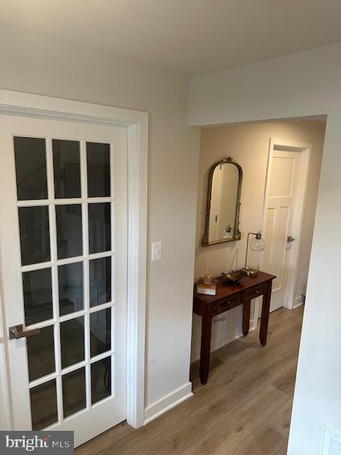 213 Lyons Creek Drive Laurel, MD 20708 - Photo 4 of 18 a view of front door with wooden floor