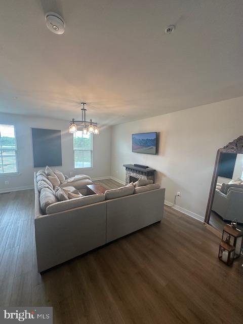 213 Lyons Creek Drive Laurel, MD 20708 - Photo 6 of 18 a living room with furniture and a flat screen tv
