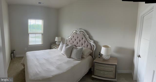 213 Lyons Creek Drive Laurel, MD 20708 - Photo 9 of 18 a bedroom with a bed and window