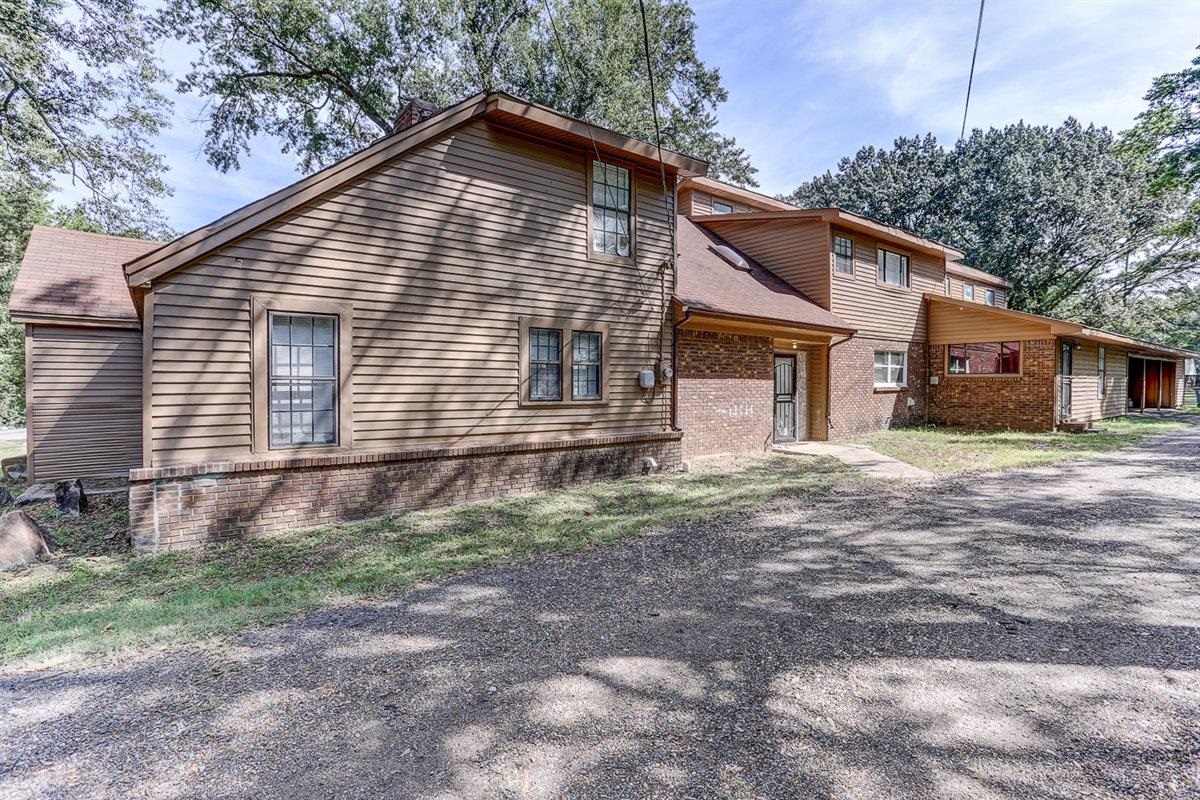 3700 Lakeview Road Memphis, TN 38116 - Photo 3 of 40 Rear view of property with brick siding