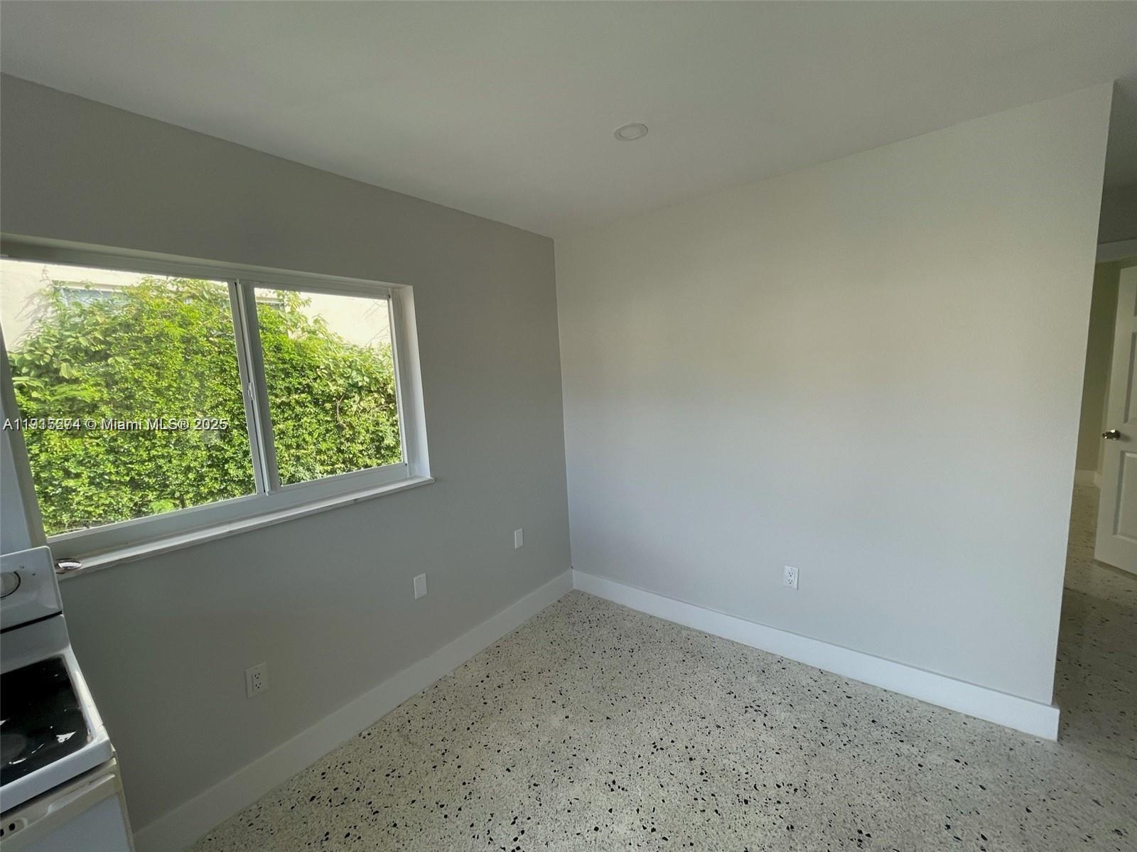 3518 Southwest 24th Terrace, Unit 3518 Miami, FL 33145 - Photo 5 of 11 a room with a window