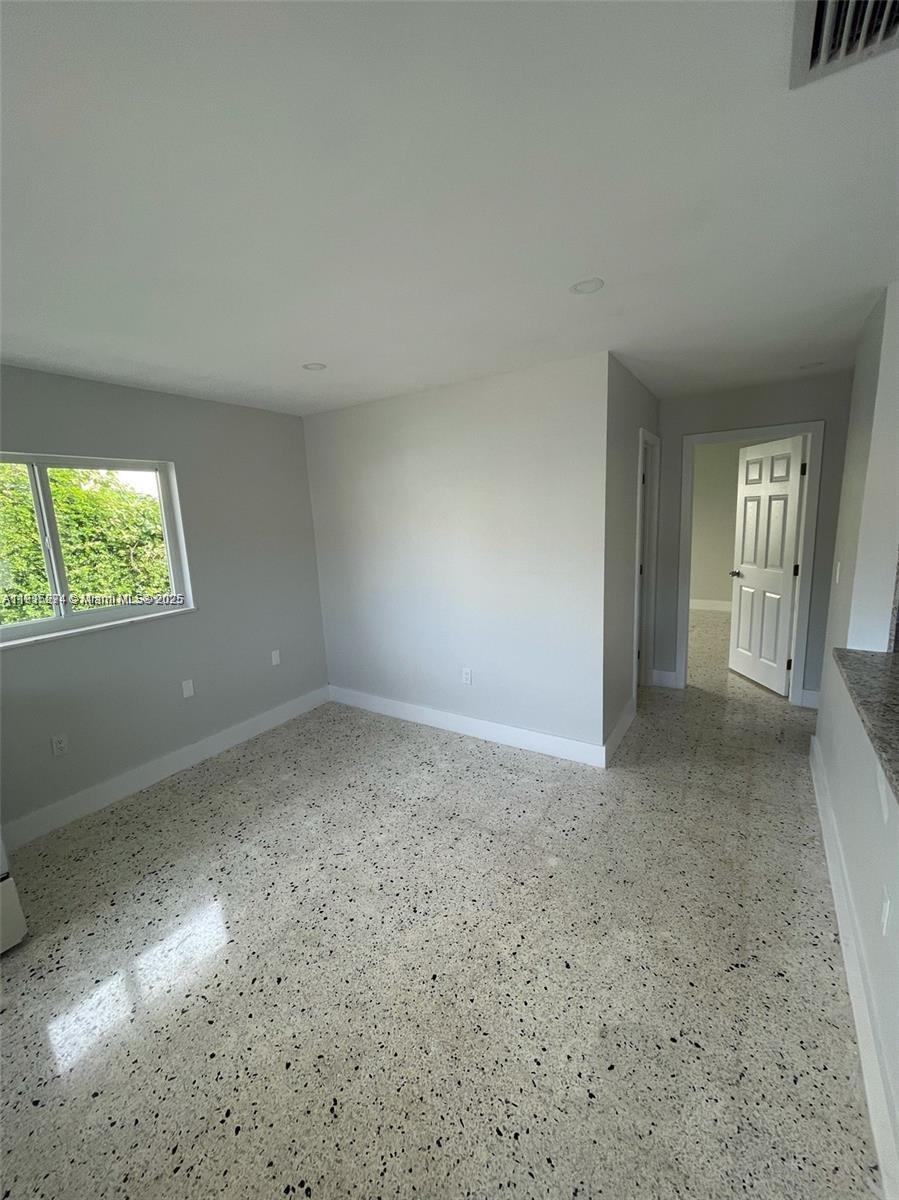 3518 Southwest 24th Terrace, Unit 3518 Miami, FL 33145 - Photo 6 of 11 an empty room with windows