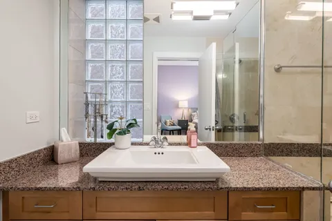 a bathroom with a bathtub and a sink