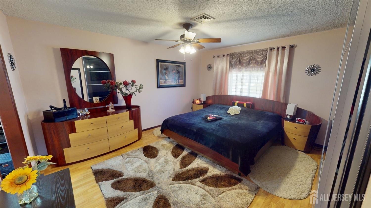 452A Closter Road, Unit B Monroe Township, NJ 08831 - Photo 11 of 46 a living room with furniture and wooden floor