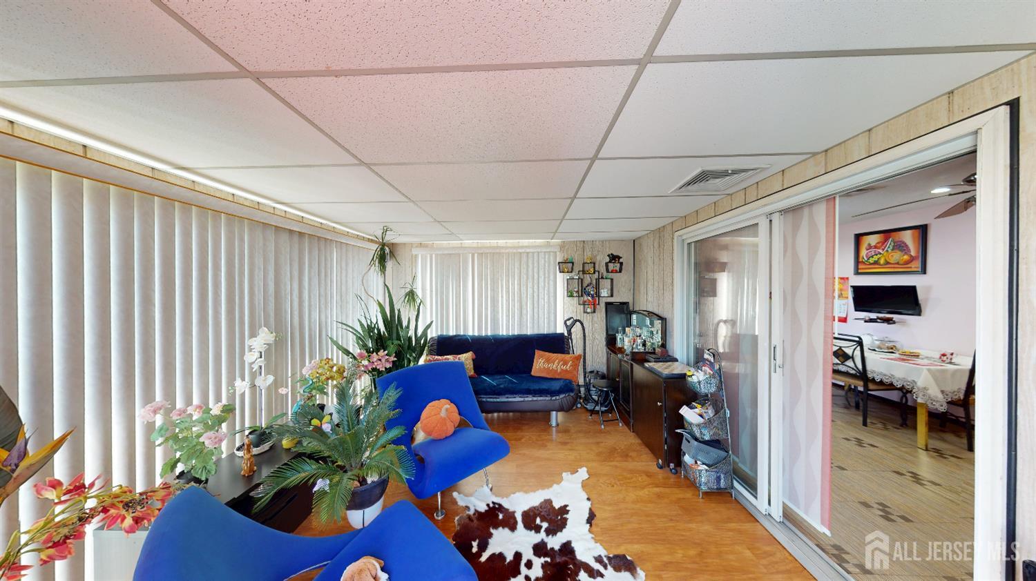 452A Closter Road, Unit B Monroe Township, NJ 08831 - Photo 22 of 46 a living room filled with furniture