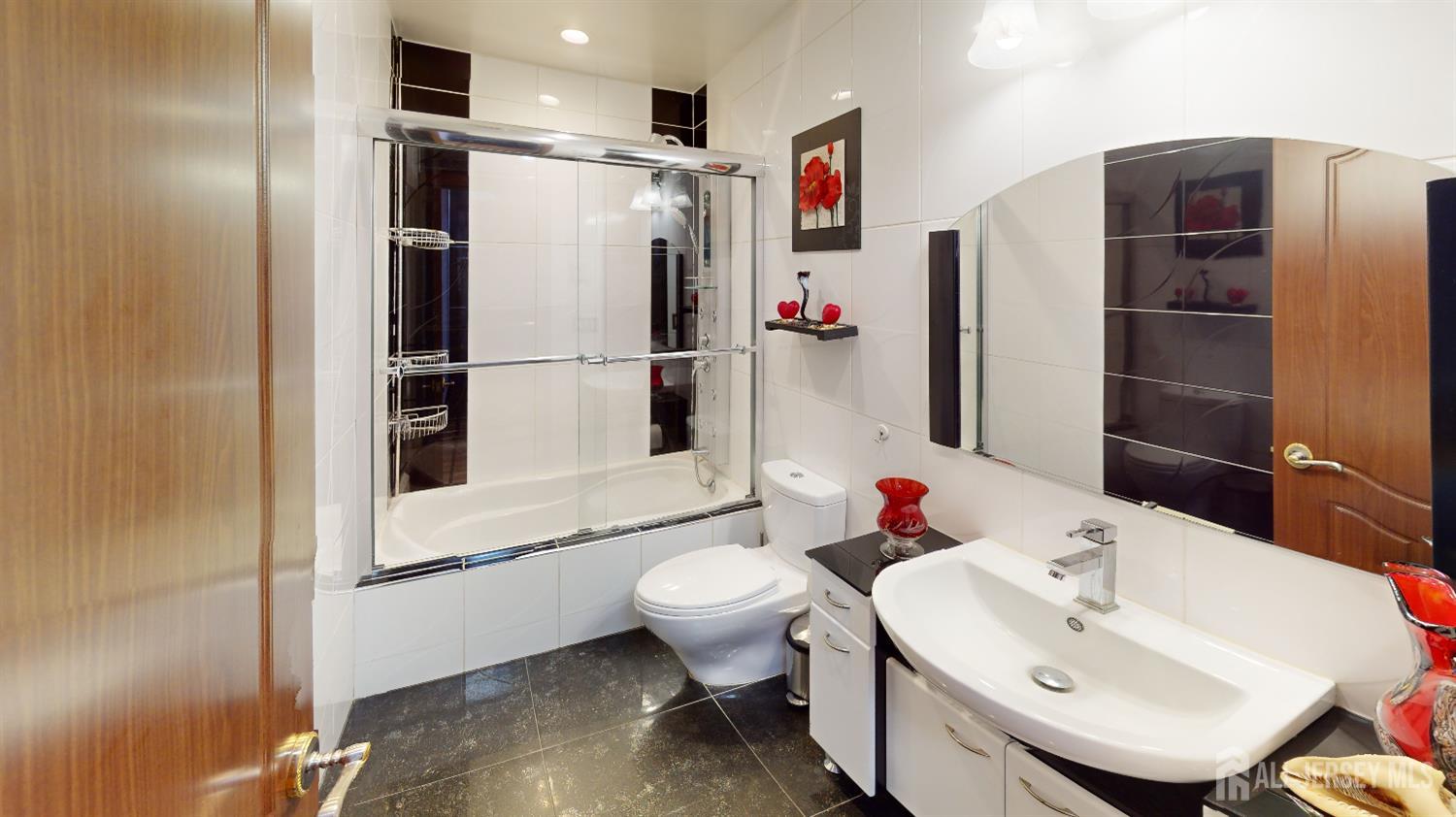 452A Closter Road, Unit B Monroe Township, NJ 08831 - Photo 23 of 46 a bathroom with a sink toilet and shower