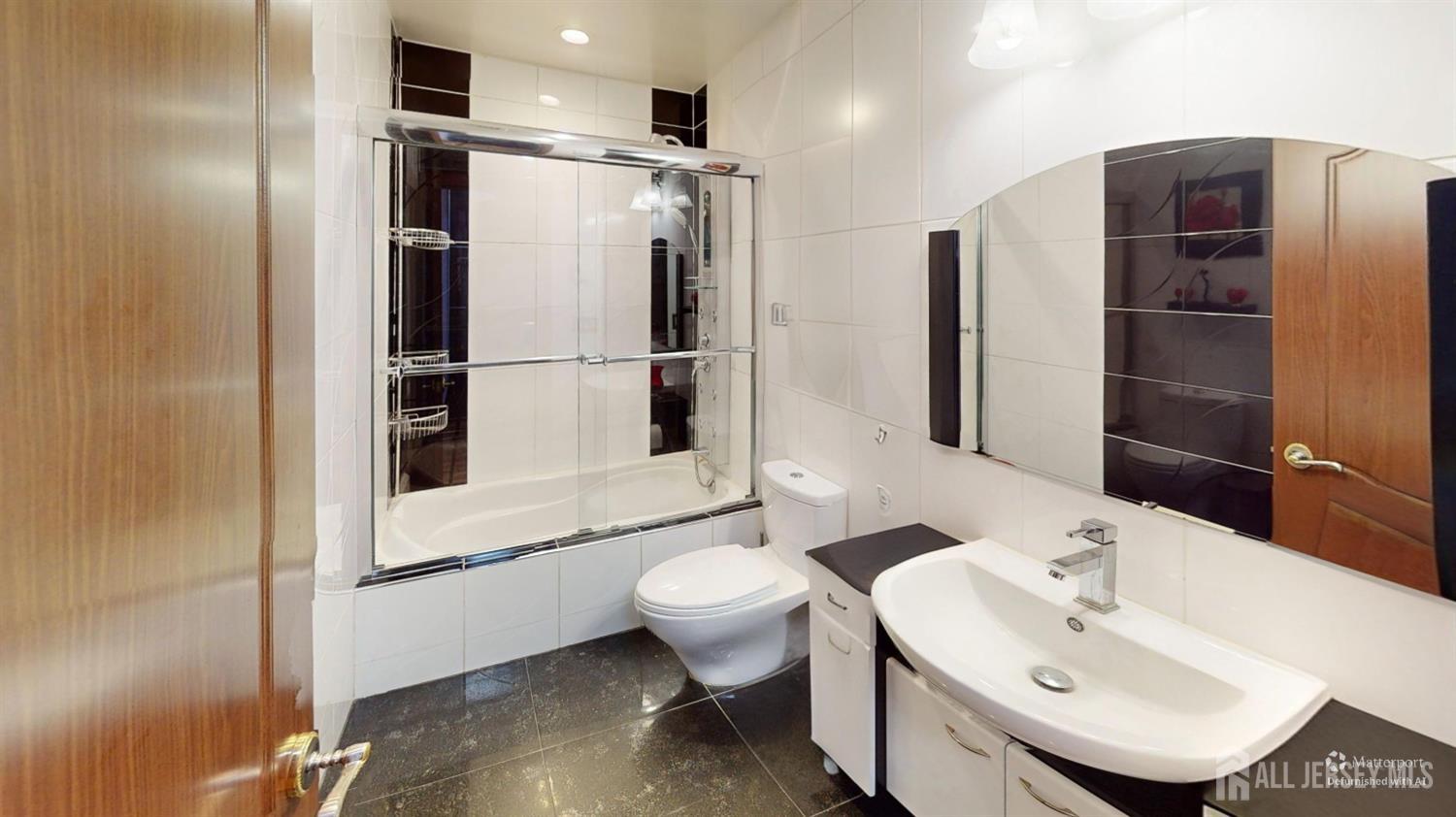 452A Closter Road, Unit B Monroe Township, NJ 08831 - Photo 24 of 46 a bathroom with a sink toilet and shower