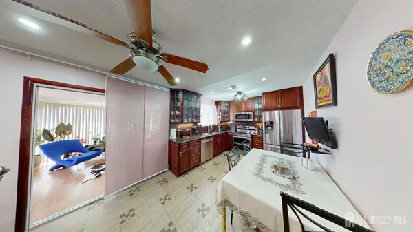 a view of a workspace with furniture