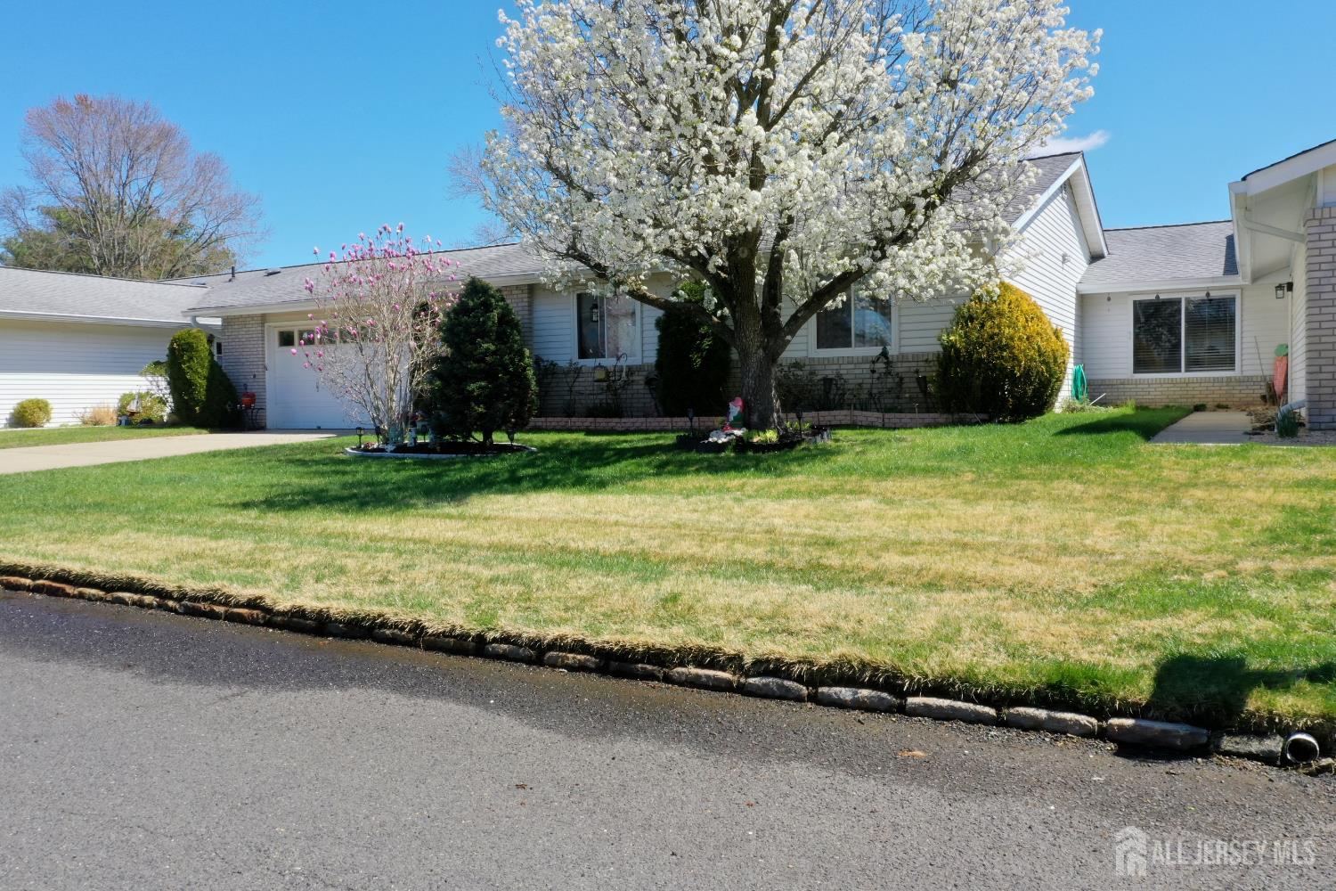 452A Closter Road, Unit B Monroe Township, NJ 08831 - Photo 38 of 46 a view of a house with a yard