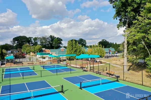 an aerial view of a house with a garden