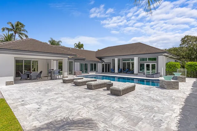 a view of house with outdoor seating space