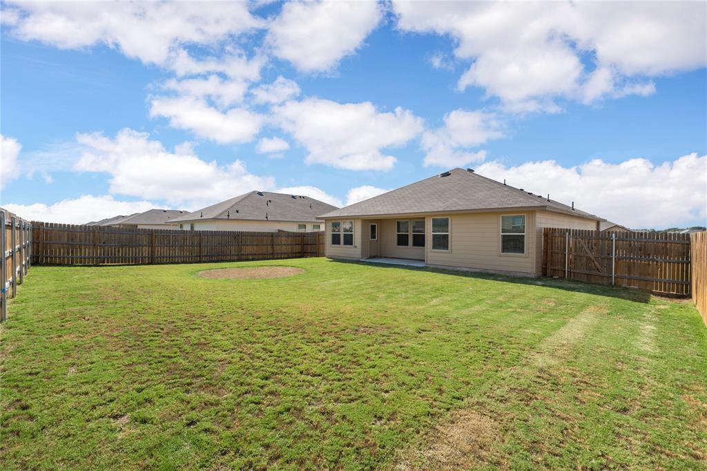 3012 Sherco Road Lorena, TX 76655 - Photo 13 of 14 a front view of a house with a garden