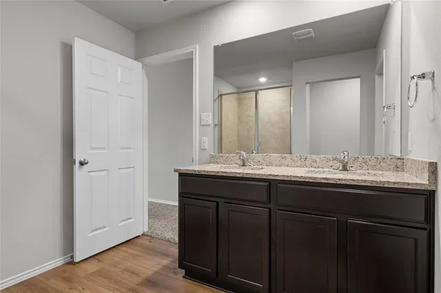 a view of a livingroom with a ceiling fan and window