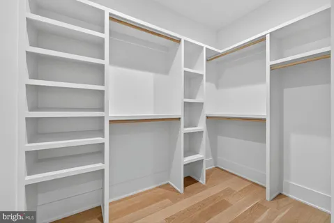 a view of an empty walk in closet