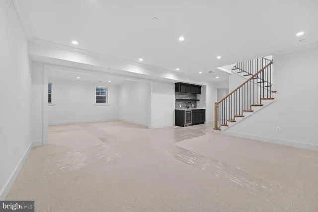 a view of a livingroom with a kitchen