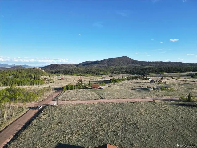 a view of a lake with mountains in the background
