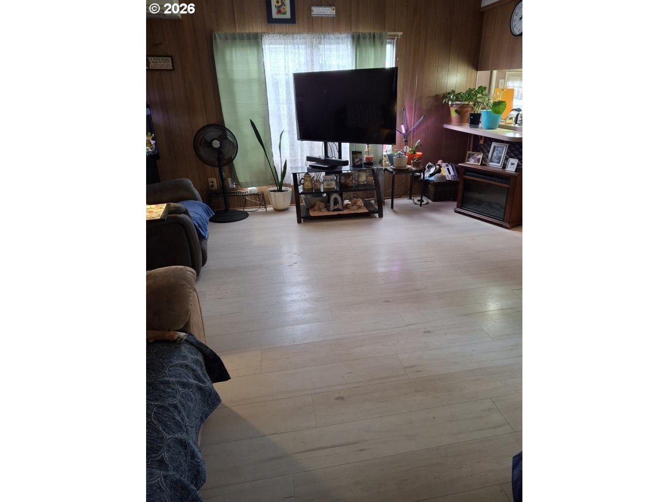 3950 Coburg Road, Unit 3 Eugene, OR 97408 - Photo 11 of 14 a living room with furniture and a flat screen tv